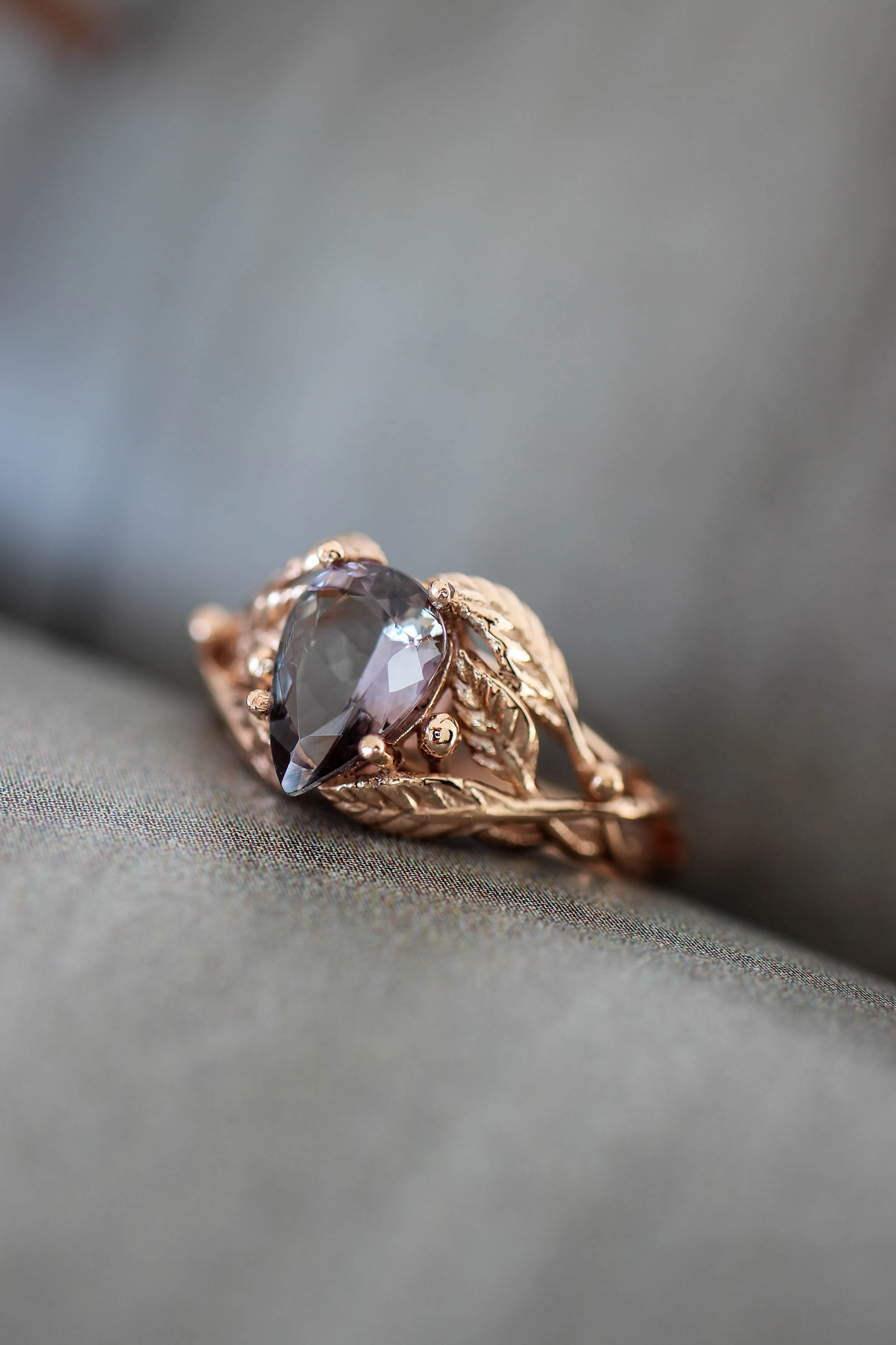 Tanzanite engagement ring, leaves ring with pear cut gemstone