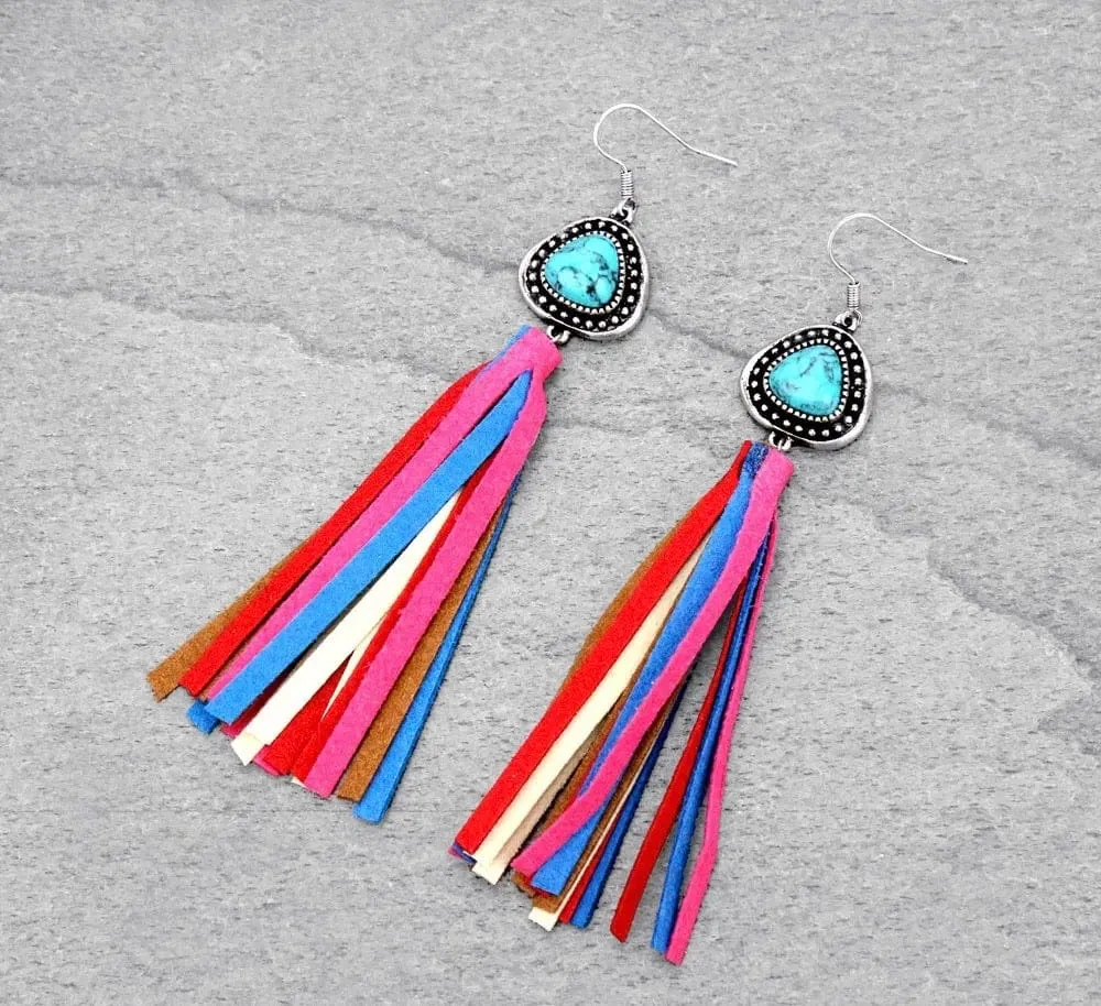 Here is an optimized title for the e-commerce product:

Handcrafted Turquoise Drop Earrings with Fringe Detailing – Boho Chic Statement Jewelry