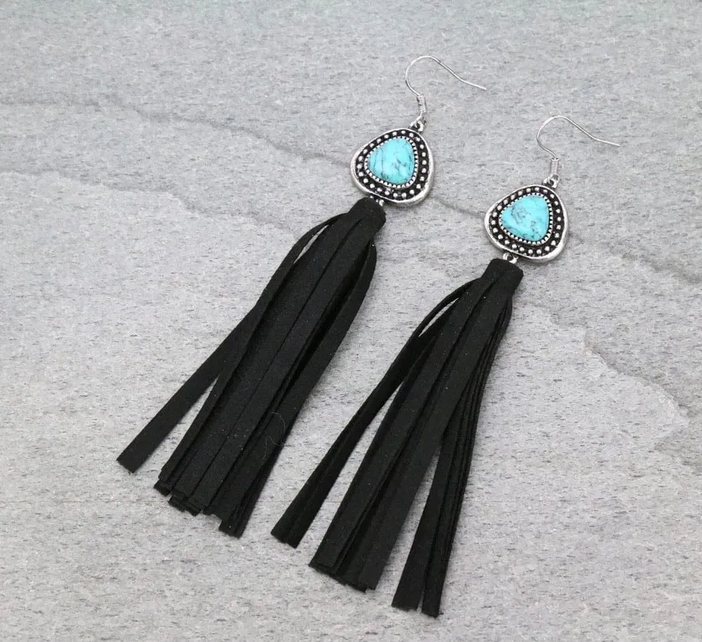 Here is an optimized title for the e-commerce product:

Handcrafted Turquoise Drop Earrings with Fringe Detailing – Boho Chic Statement Jewelry