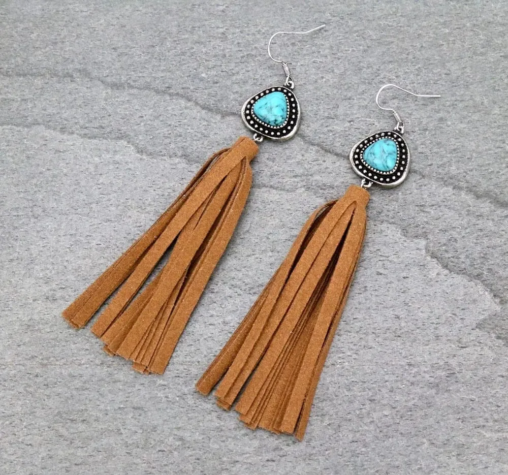 Here is an optimized title for the e-commerce product:

Handcrafted Turquoise Drop Earrings with Fringe Detailing – Boho Chic Statement Jewelry